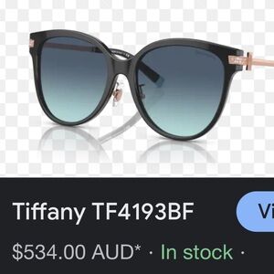 Like new Tiffany & Co. Black Sunglasses with Blue Case